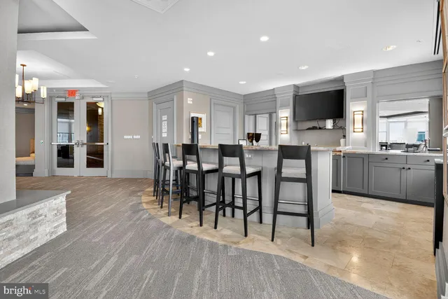 a view dining room with furniture and wooden floor