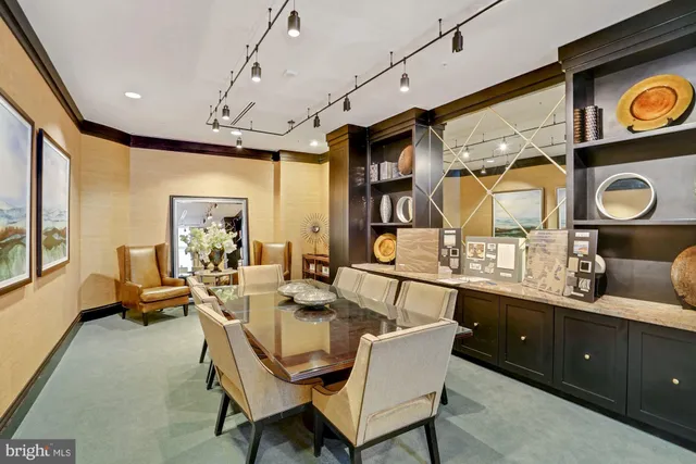 a dining room with wooden floor and a window
