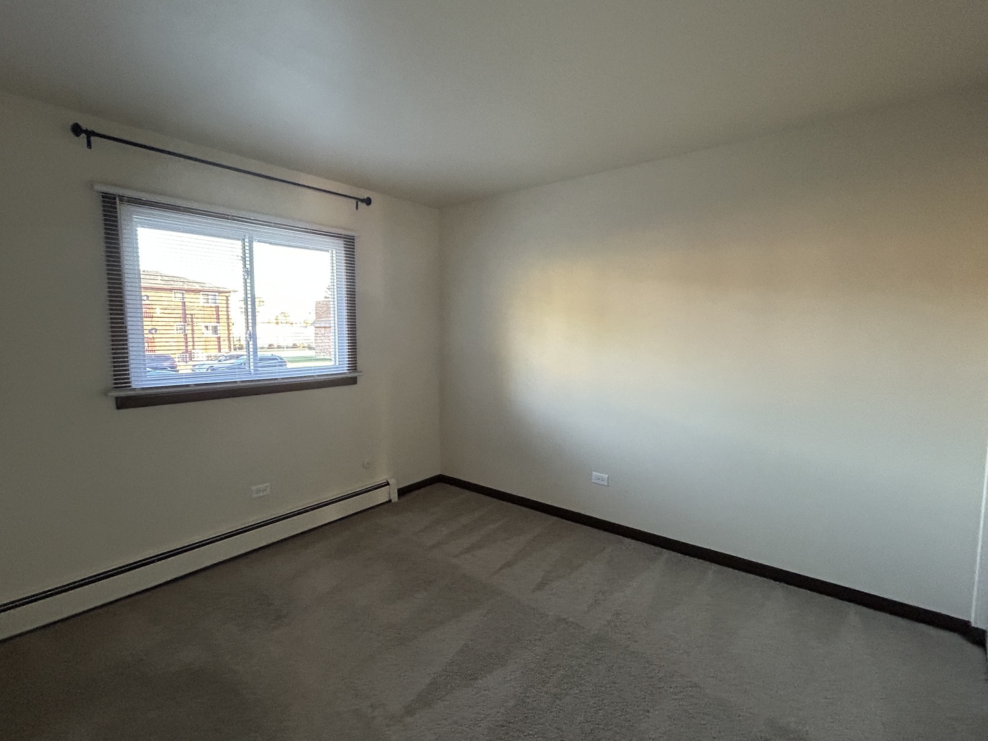 1300 Getzelman Drive, Unit 4 Elgin, IL 60123 - Photo 6 of 8 an empty room with a window