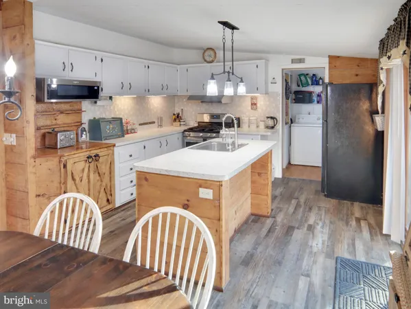 $349,995 | 516 Roberts Road, Great Cacapon, WV 25422