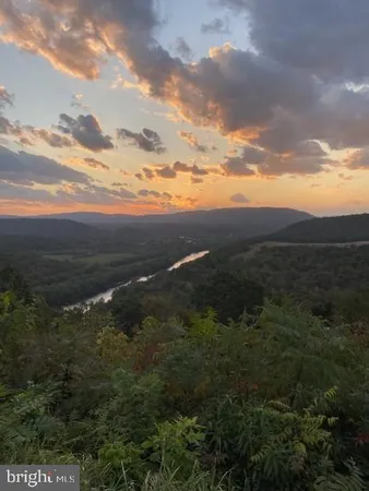 $349,995 | 516 Roberts Road, Great Cacapon, WV 25422