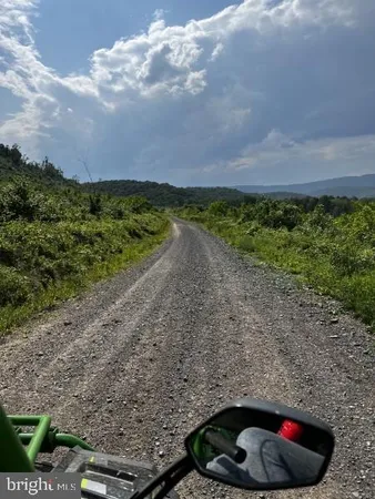 $349,995 | 516 Roberts Road, Great Cacapon, WV 25422