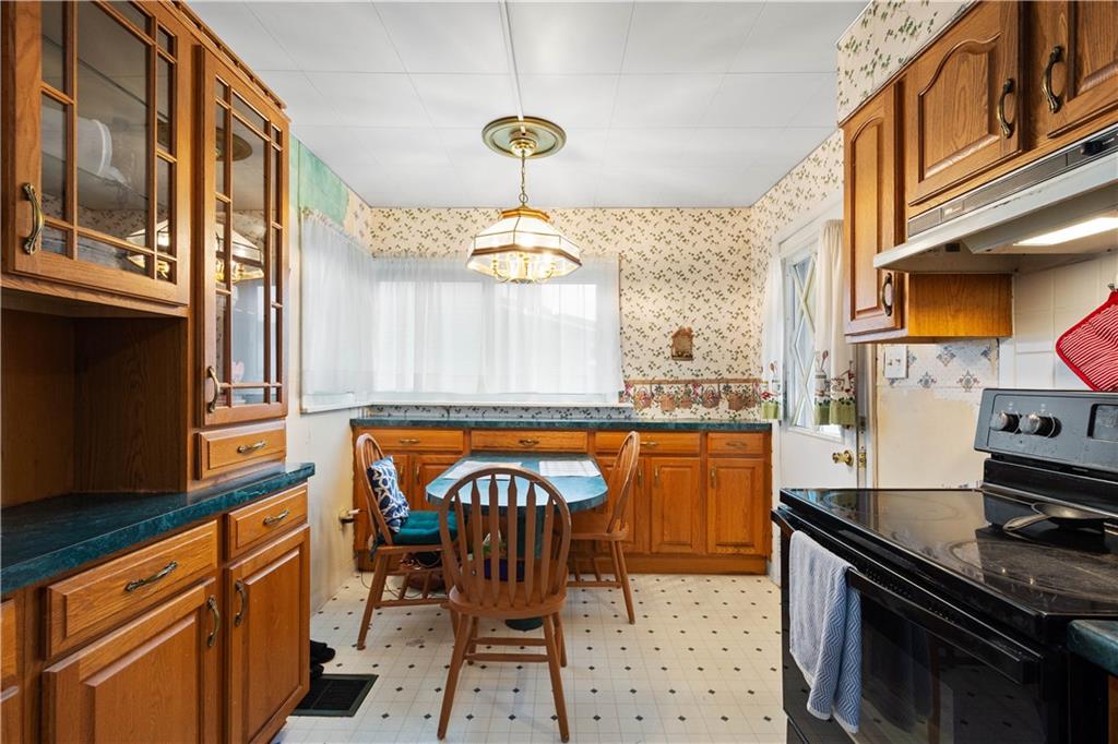330 Main Street Richeyville, PA 15358 - Photo 13 of 28 a kitchen with stainless steel appliances granite countertop a stove a sink and a refrigerator