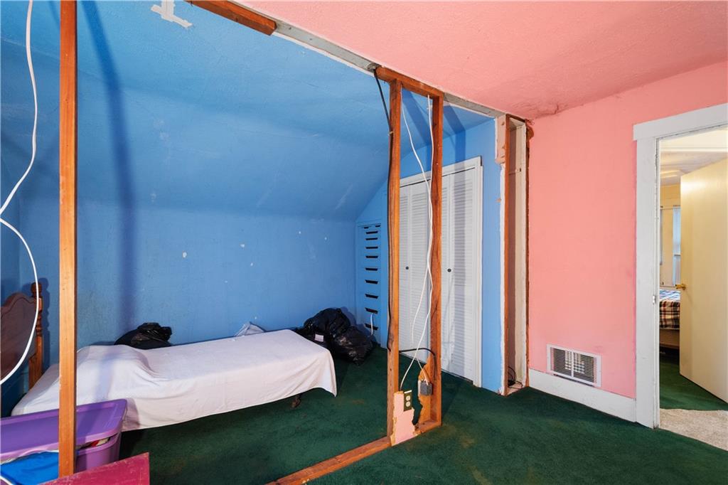 330 Main Street Richeyville, PA 15358 - Photo 20 of 28 a bedroom with a bed and a mirror