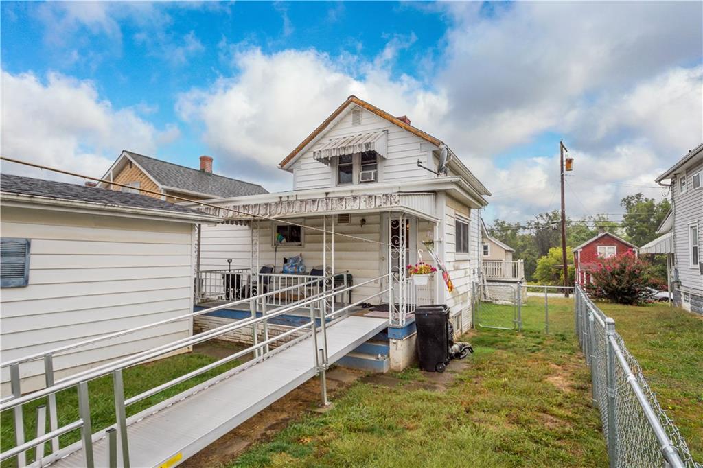 330 Main Street Richeyville, PA 15358 - Photo 23 of 28 a view of a house with a yard patio and furniture