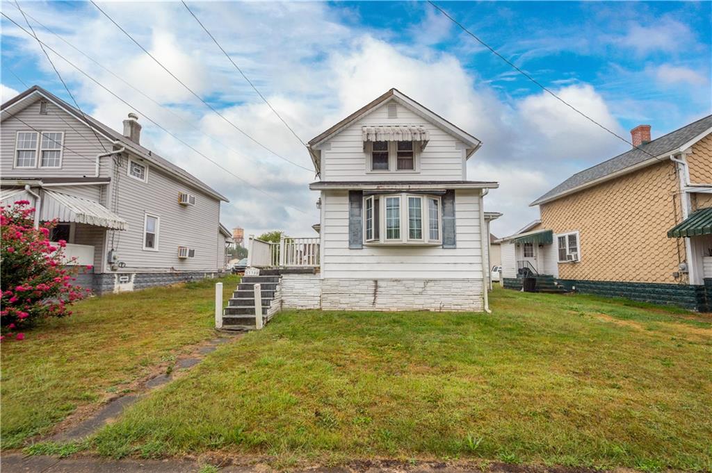 330 Main Street Richeyville, PA 15358 - Photo 27 of 28 a view of a house with a big yard potted plants and large tree