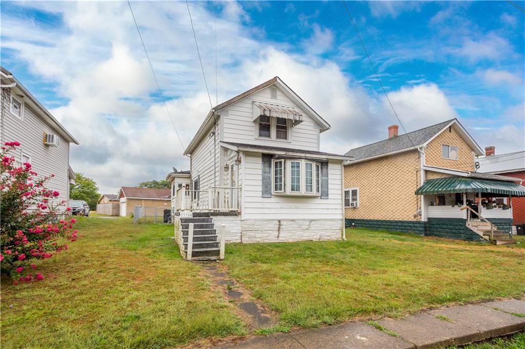 330 Main Street Richeyville, PA 15358 - Photo 28 of 28 a front view of a house with a yard