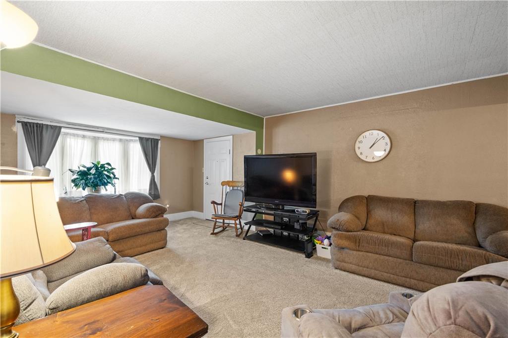 330 Main Street Richeyville, PA 15358 - Photo 3 of 28 a living room with furniture and a flat screen tv