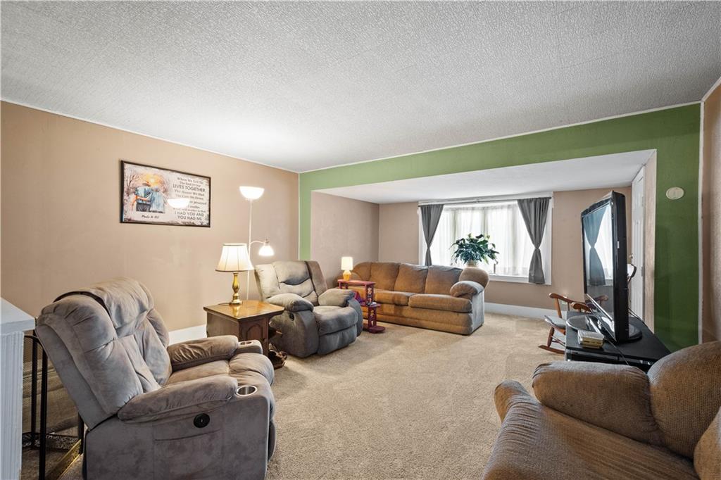 330 Main Street Richeyville, PA 15358 - Photo 4 of 28 a living room with furniture chess board and a window