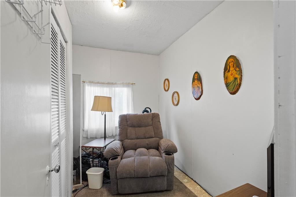330 Main Street Richeyville, PA 15358 - Photo 8 of 28 a living room with furniture and a window