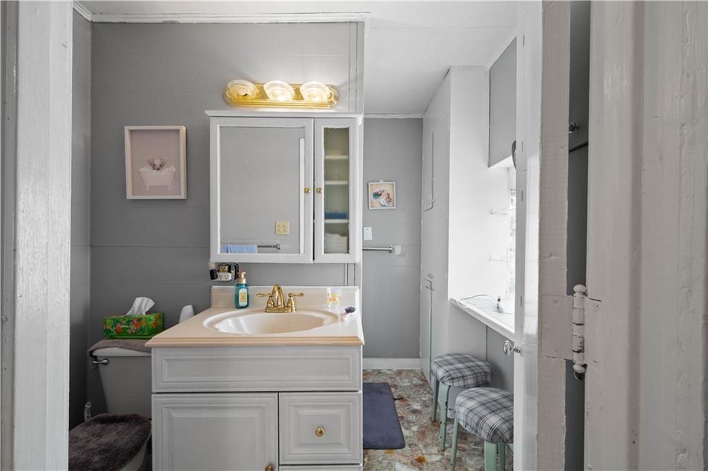 330 Main Street Richeyville, PA 15358 - Photo 9 of 28 a bathroom with a sink and a mirror