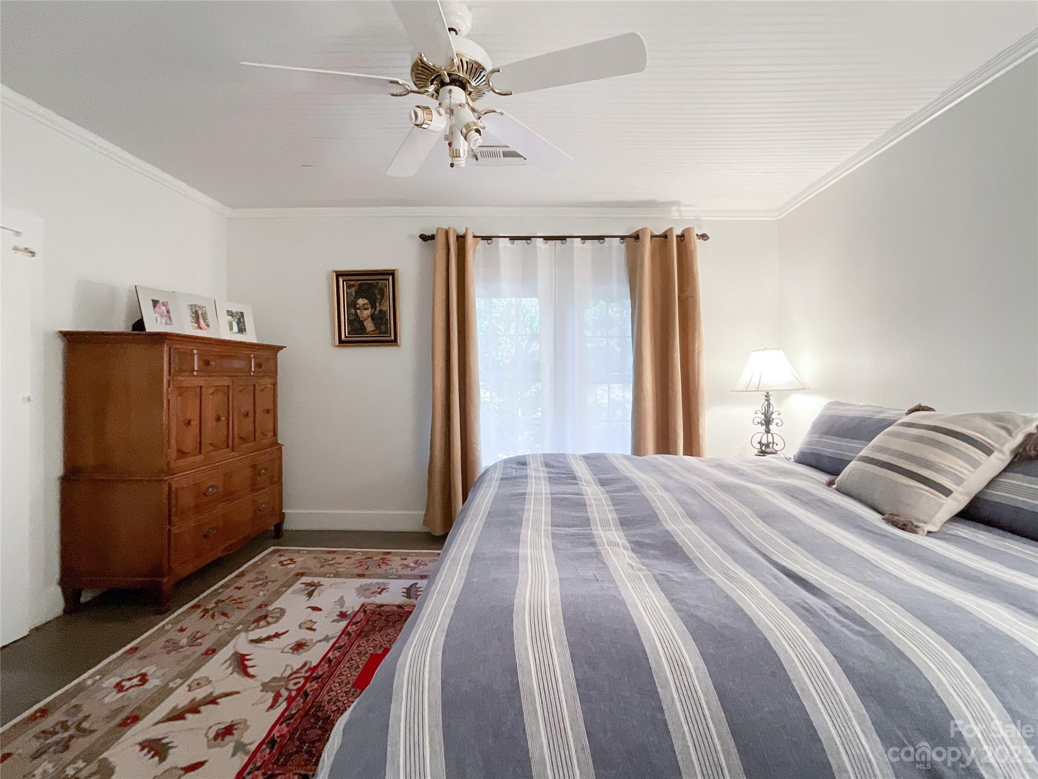 5100 Tabernacle Road Lancaster, SC 29720 - Photo 12 of 39 a bedroom with a bed and a dresser