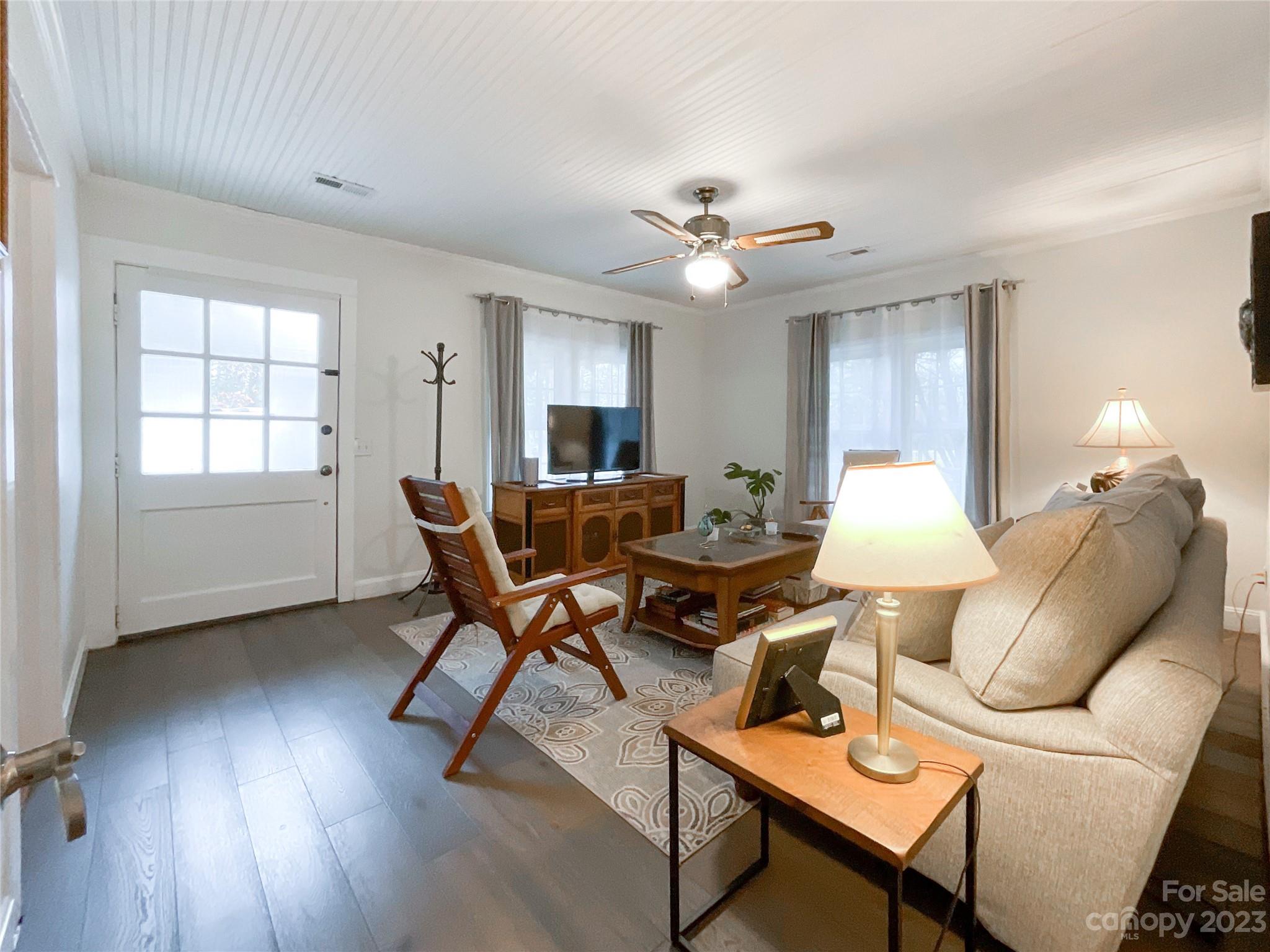 5100 Tabernacle Road Lancaster, SC 29720 - Photo 4 of 39 a living room with furniture a wooden floor and a window