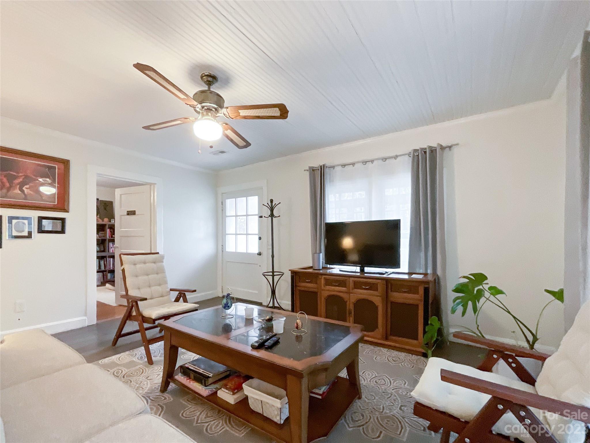 5100 Tabernacle Road Lancaster, SC 29720 - Photo 5 of 39 a living room with furniture and a flat screen tv