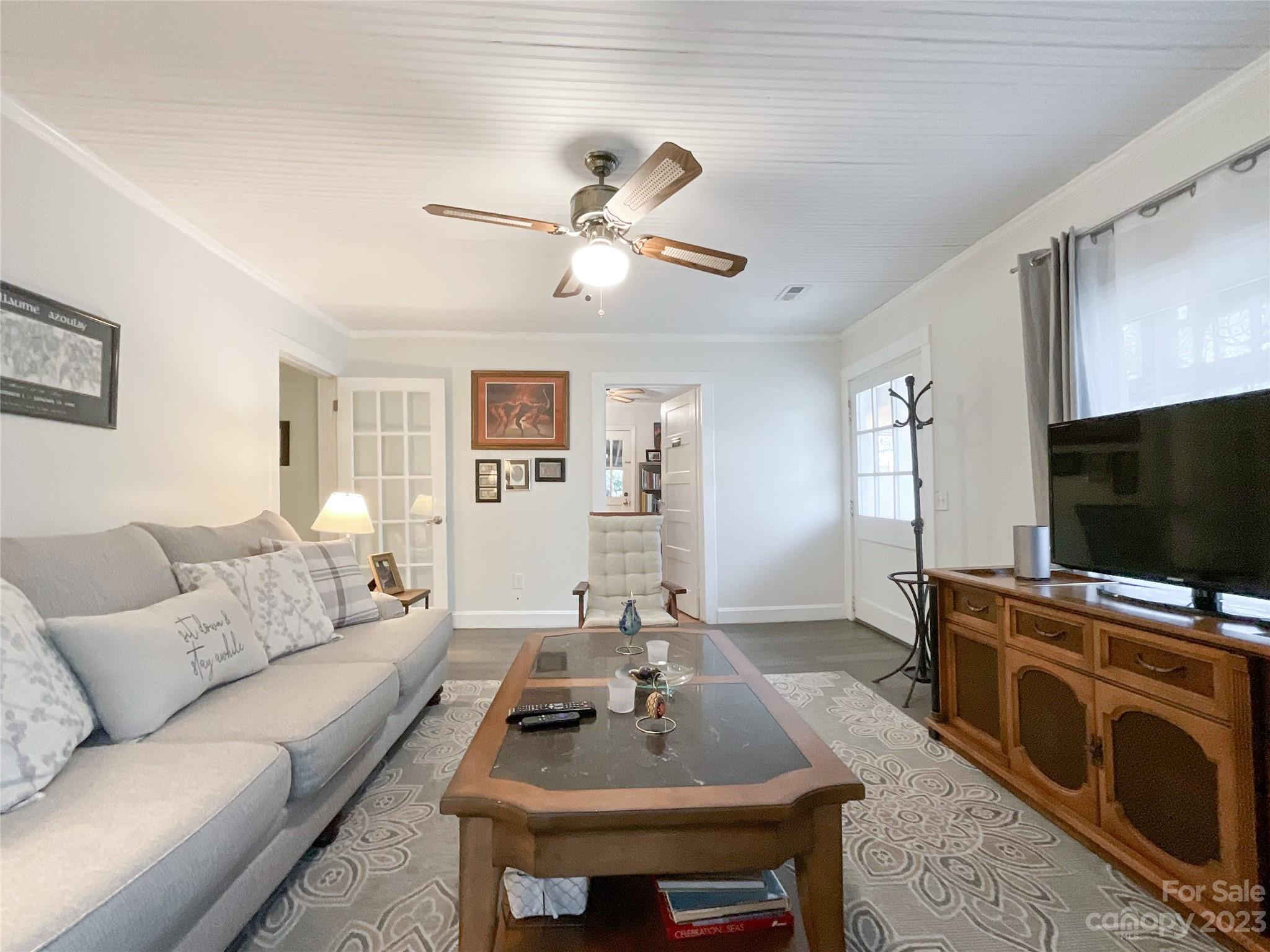 5100 Tabernacle Road Lancaster, SC 29720 - Photo 7 of 39 a living room with furniture a flat screen tv and a window