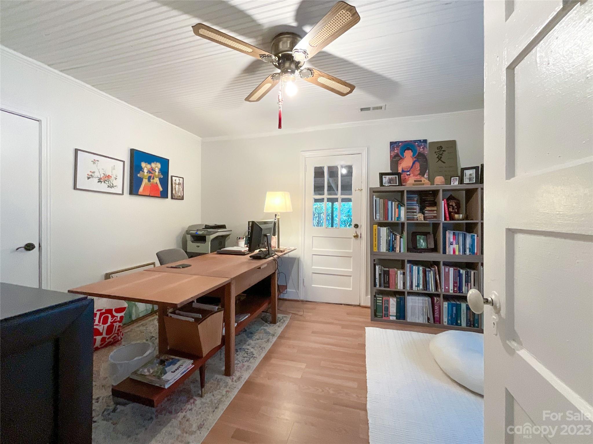 5100 Tabernacle Road Lancaster, SC 29720 - Photo 10 of 39 a view of a workspace with furniture and a bookshelf