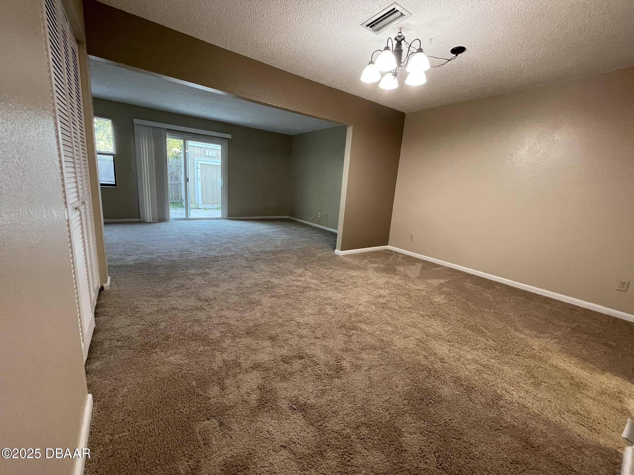112 Tomoka Meadows Boulevard Ormond Beach, FL 32174 - Photo 21 of 53 a view of an empty room with a window