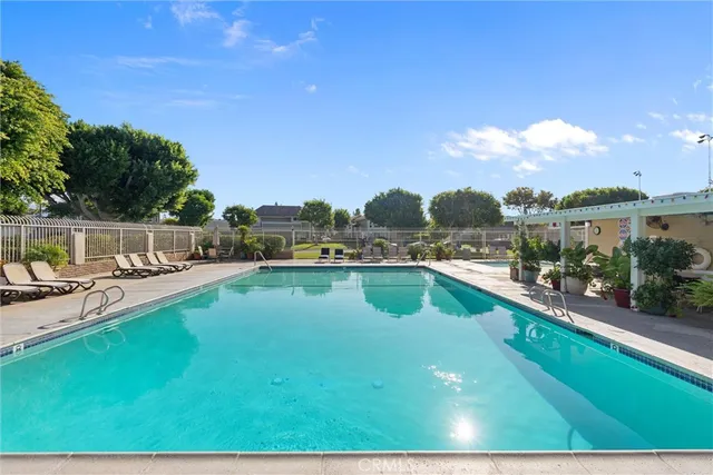 a view of a swimming pool with a terrace
