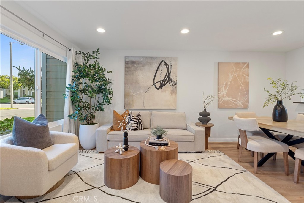 32 Kazan Street Irvine, CA 92604 - Photo 5 of 39 a living room with furniture and flowers