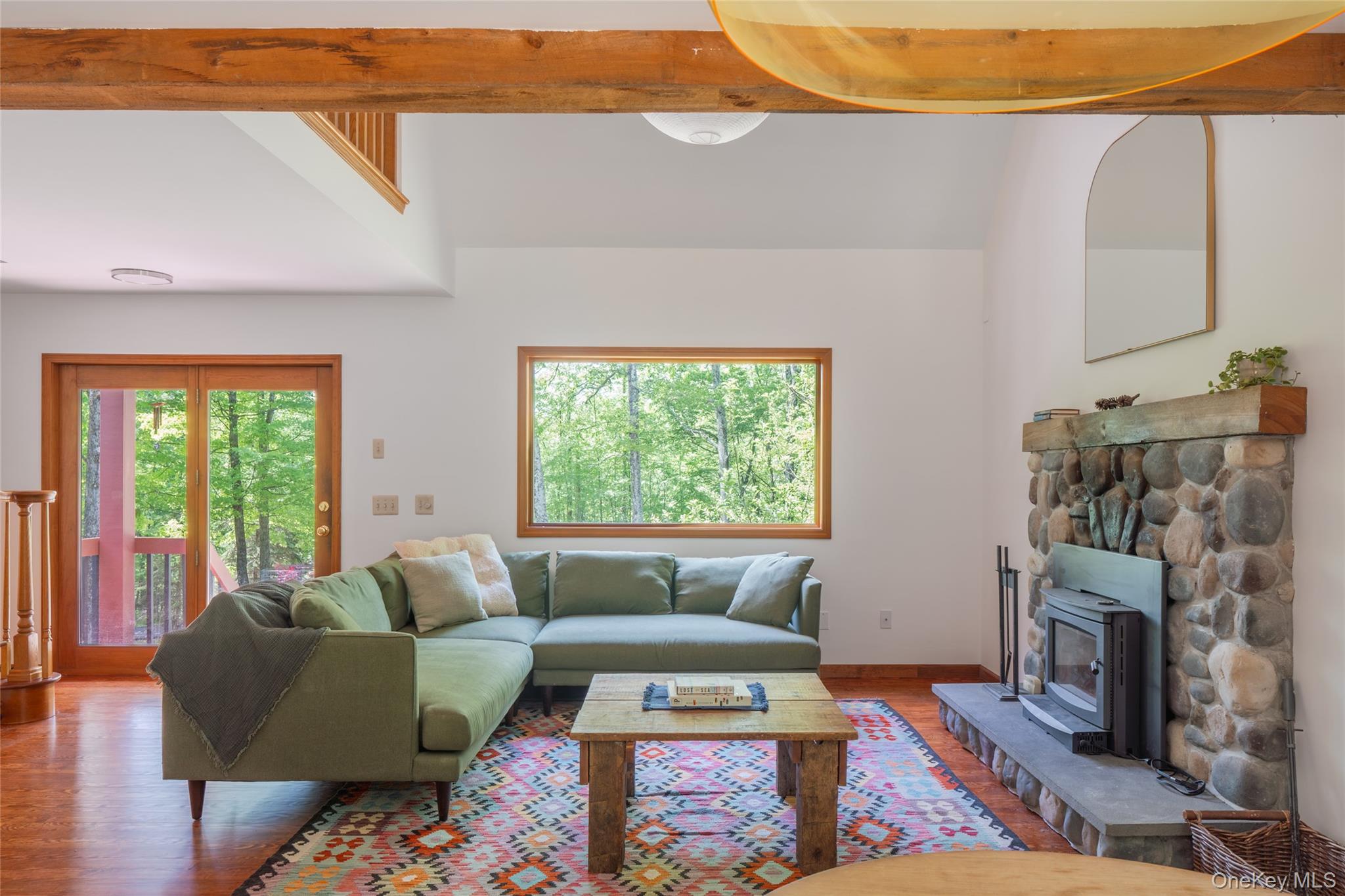 182 Frey Road Pine Bush, NY 12566 - Photo 2 of 33 a living room with furniture and a fireplace
