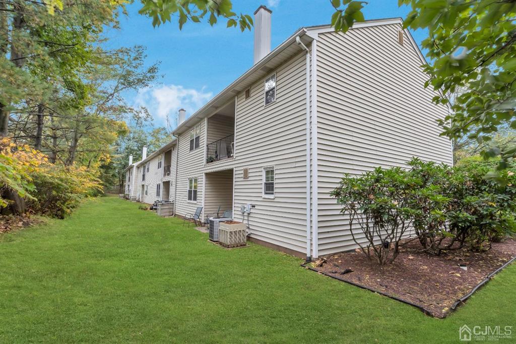 32 Hanover Square Middlesex, NJ 08846 - Photo 21 of 25 a view of a house with a yard