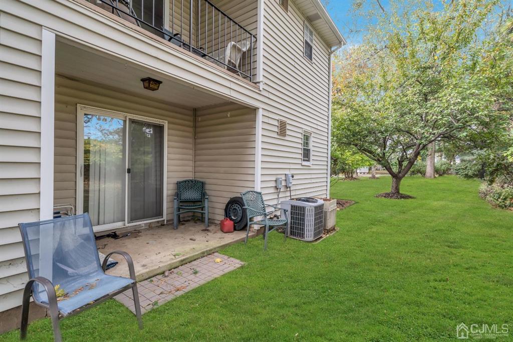 32 Hanover Square Middlesex, NJ 08846 - Photo 25 of 25 a view of a house with backyard and a sitting area