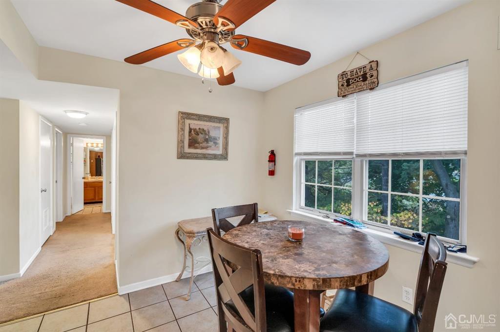 32 Hanover Square Middlesex, NJ 08846 - Photo 9 of 25 a view of a dining room with furniture window and wooden floor
