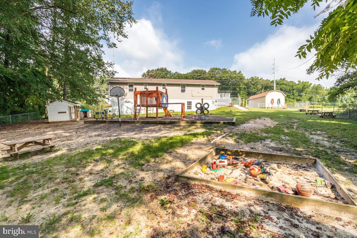 4425 Solomons Island Road Huntingtown, MD 20639 - Photo 40 of 65 a front view of a house with a yard