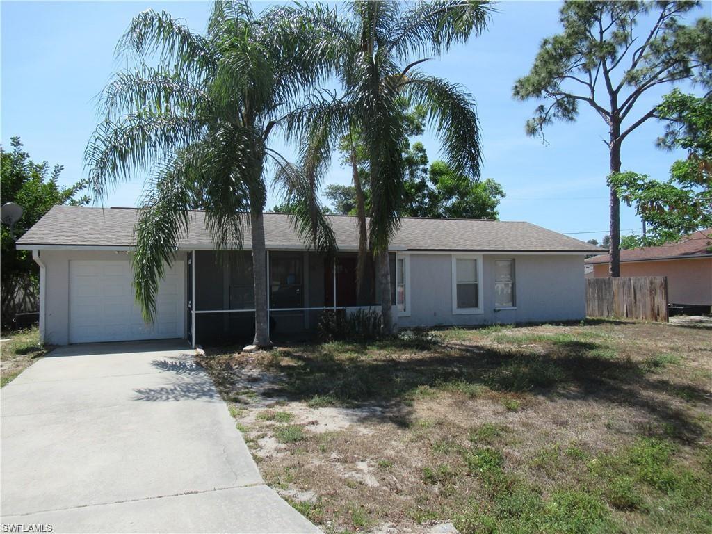 18608 Sebring Road Fort Myers, FL 33967 - Photo 1 of 13 a backyard of a house