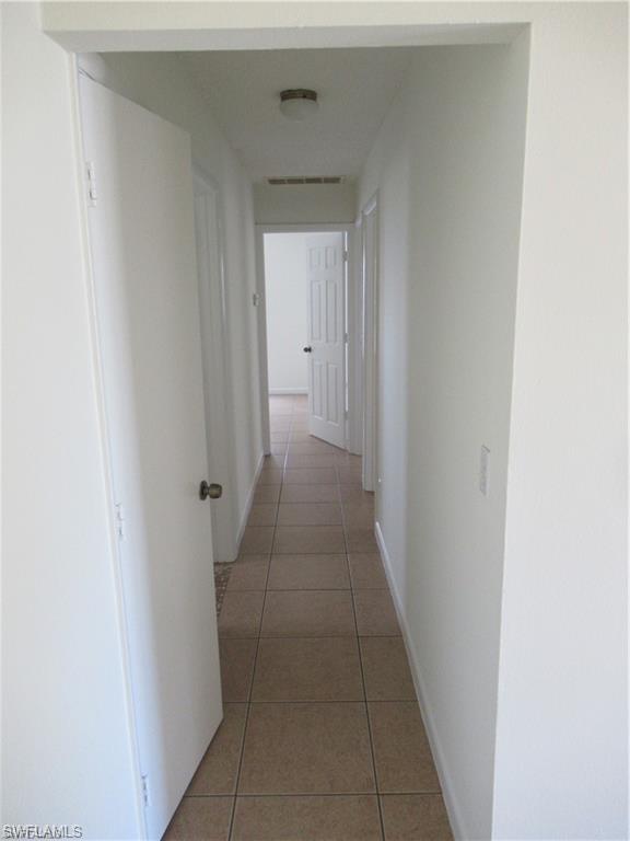 18608 Sebring Road Fort Myers, FL 33967 - Photo 7 of 13 a big room with closet in it