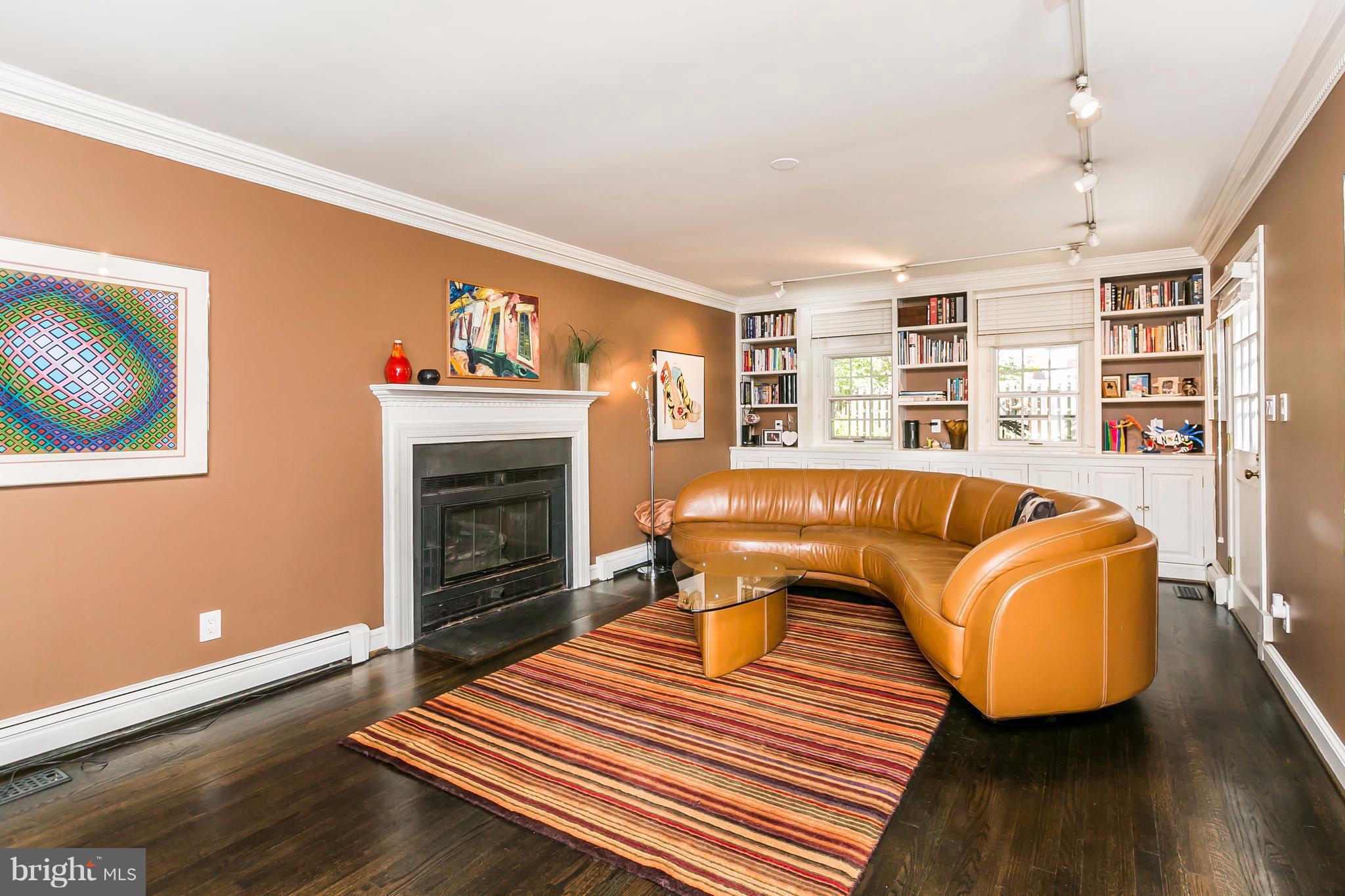 2 St Johns Road Baltimore, MD 21210 - Photo 11 of 30 a living room with furniture and a fireplace