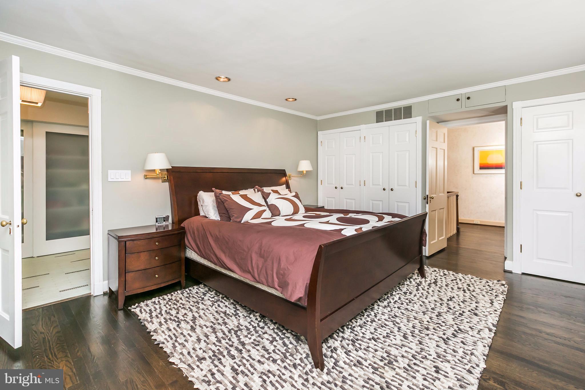 2 St Johns Road Baltimore, MD 21210 - Photo 14 of 30 a bedroom with a bed and wooden floor