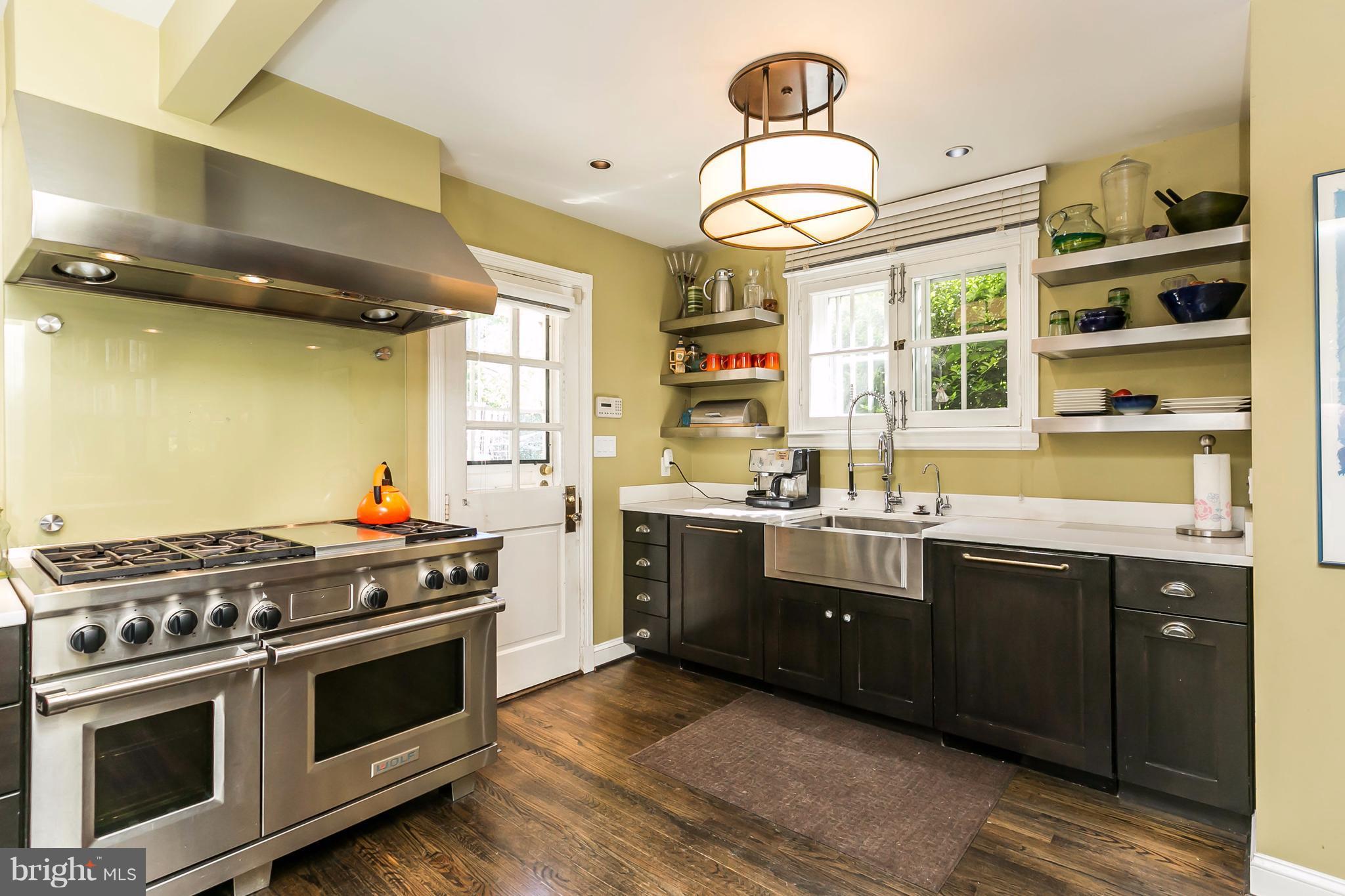 2 St Johns Road Baltimore, MD 21210 - Photo 10 of 30 a kitchen with a stove and a sink