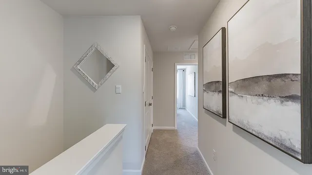 a view of a hallway with closet