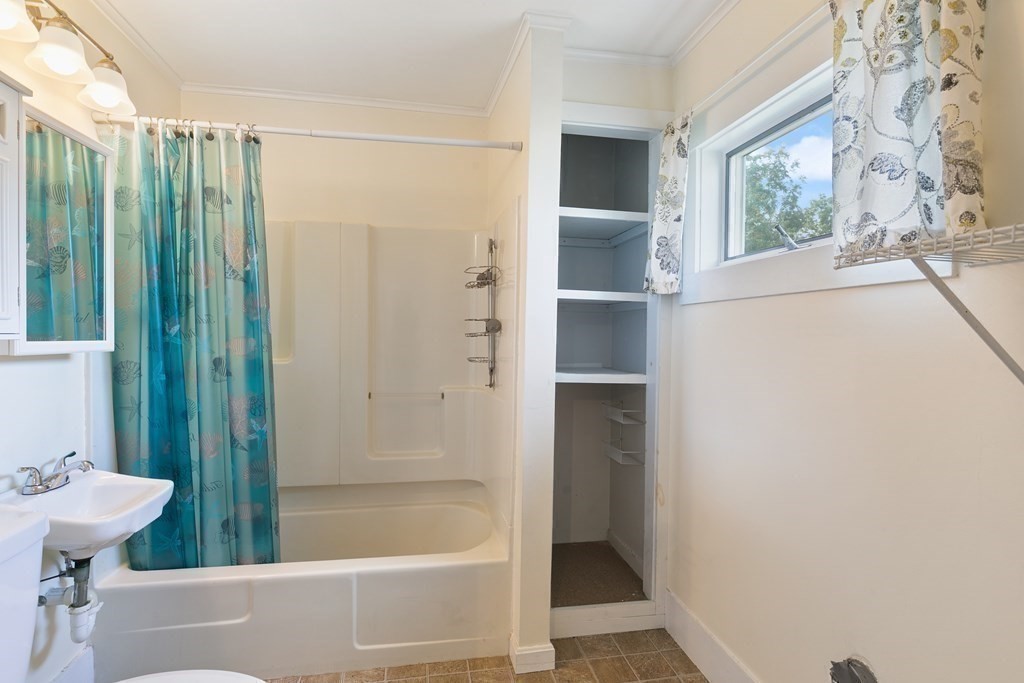 16 Silver Street Haverhill, MA 01832 - Photo 16 of 16 a bathroom with a bathtub and a shower