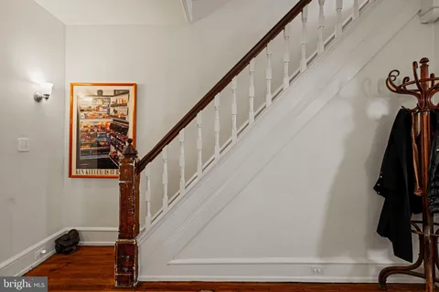 a view of entryway with wooden floor
