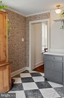 a bathroom with a shower and a toilet