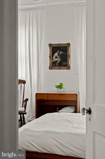 a room with a bed and a table