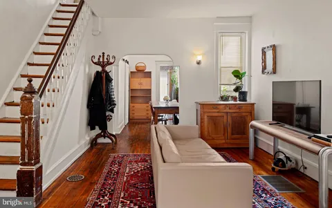 a room with furniture and a fireplace