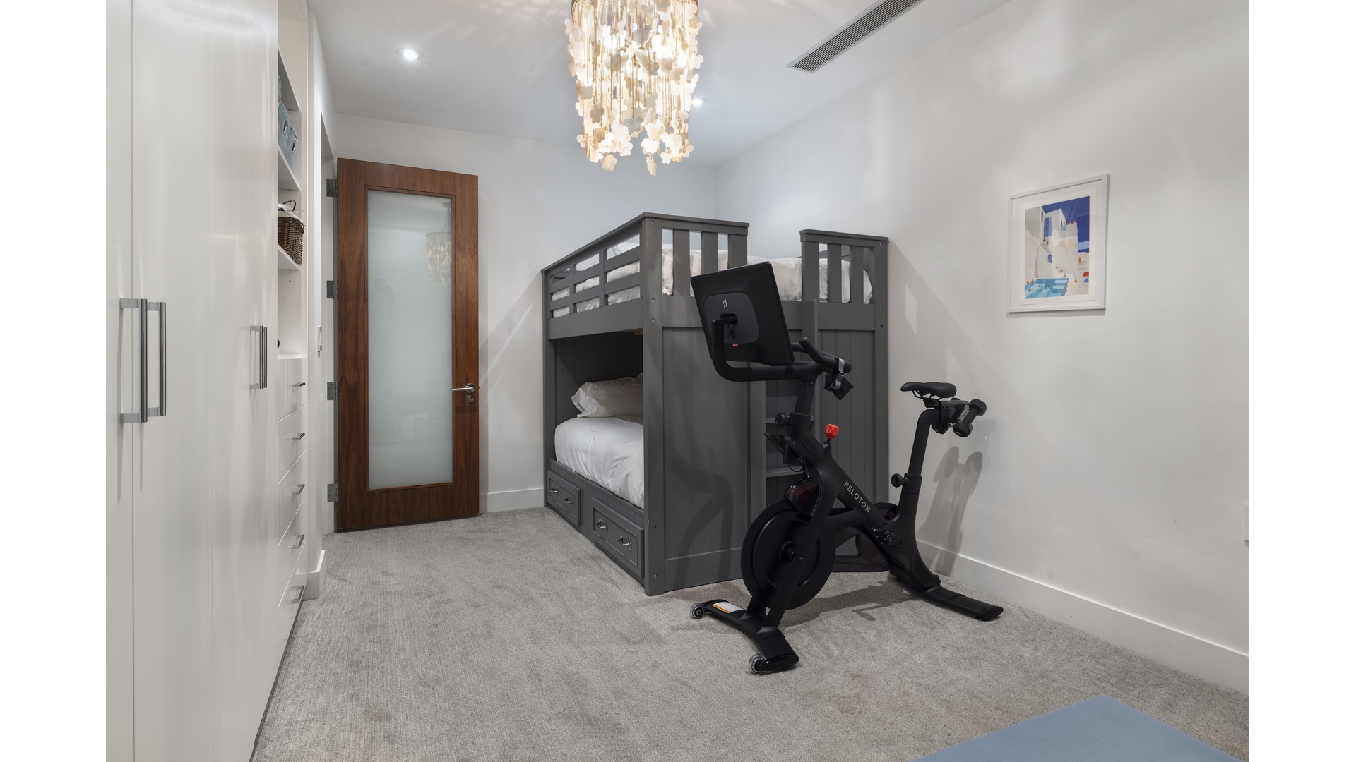 433 East 74th Street, Unit TH/1B Manhattan, NY 10021 - Photo 12 of 15 a view of a room with gym equipment