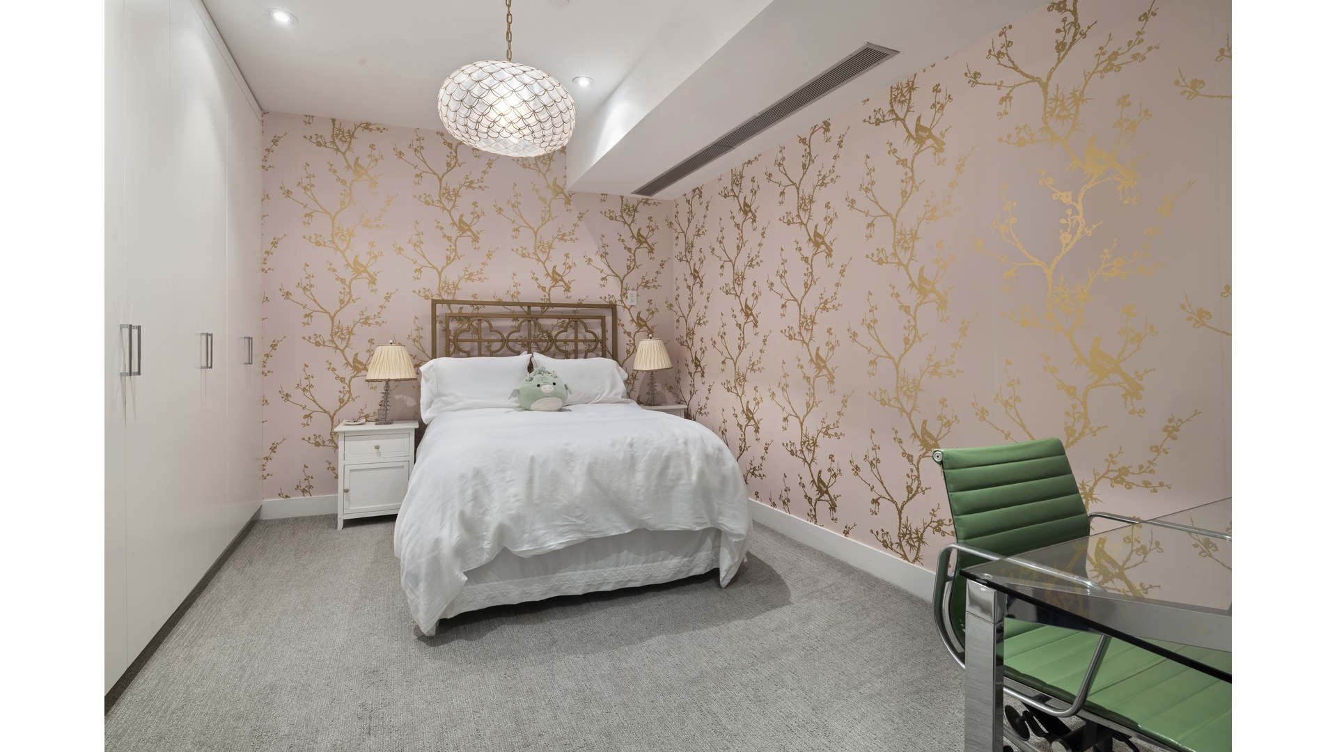 433 East 74th Street, Unit TH/1B Manhattan, NY 10021 - Photo 13 of 15 a bedroom with a bed and a chair