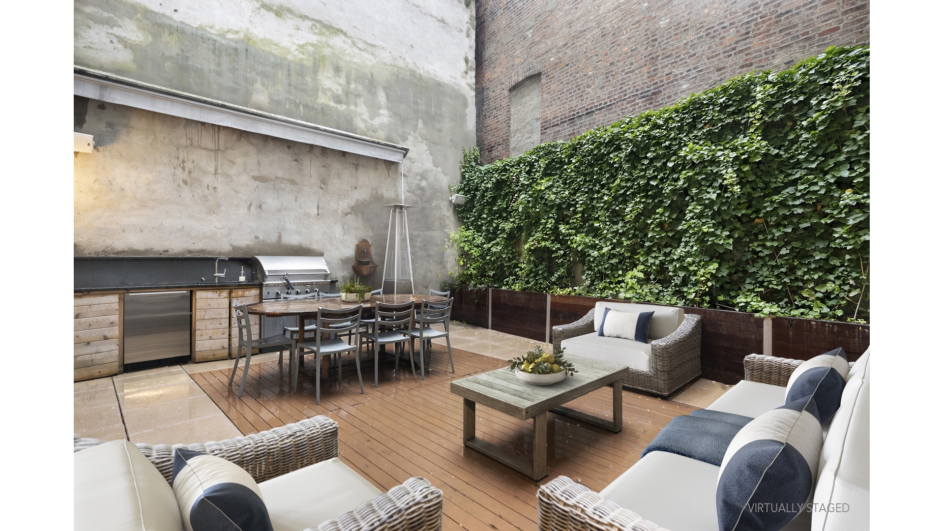433 East 74th Street, Unit TH/1B Manhattan, NY 10021 - Photo 3 of 15 a backyard of a house with outdoor seating