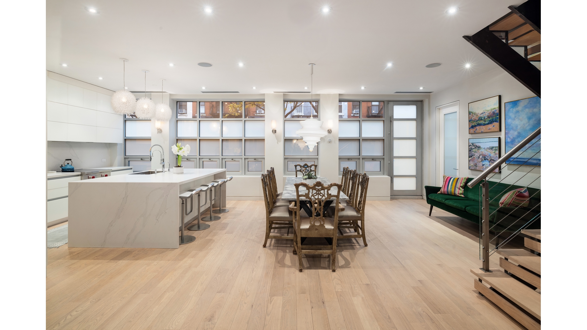 433 East 74th Street, Unit TH/1B Manhattan, NY 10021 - Photo 4 of 15 a living room with furniture and a wooden floor