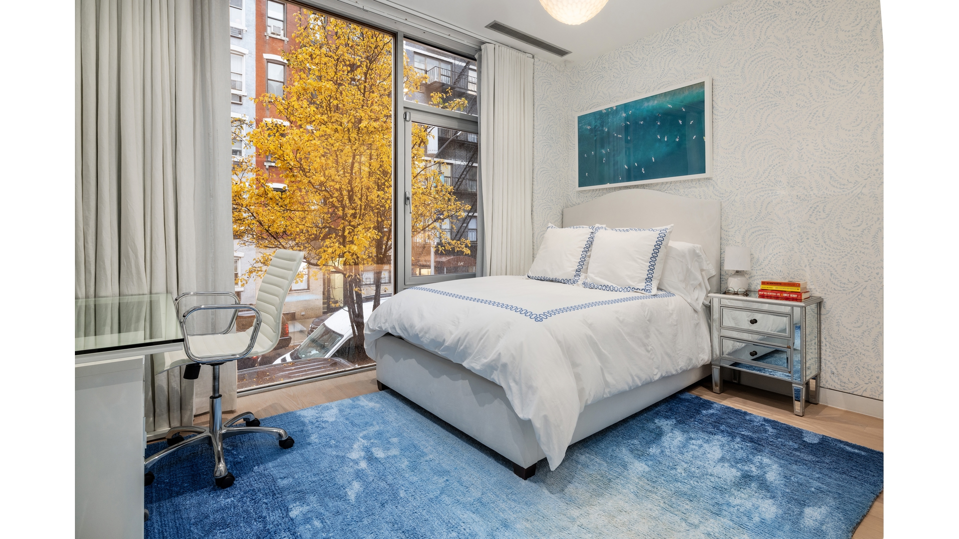433 East 74th Street, Unit TH/1B Manhattan, NY 10021 - Photo 8 of 15 a bedroom with a bed chair and a window