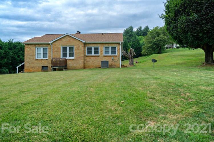 1943 Beaverdam Road Canton, NC 28716 - Photo 20 of 31 a view of a house with a yard
