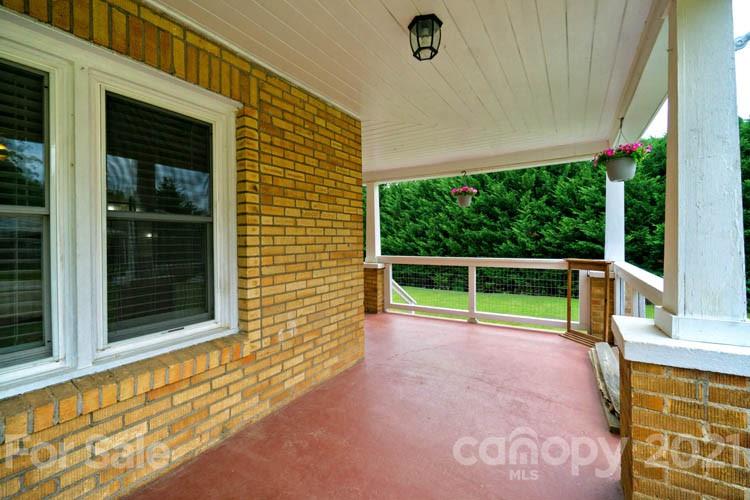 1943 Beaverdam Road Canton, NC 28716 - Photo 23 of 31 a view of a backyard with porch
