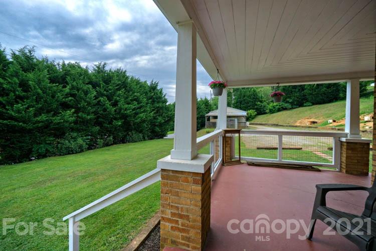 1943 Beaverdam Road Canton, NC 28716 - Photo 25 of 31 a view of a patio with a garden