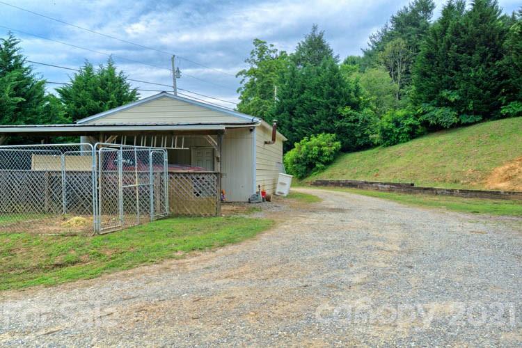 1943 Beaverdam Road Canton, NC 28716 - Photo 28 of 31 a front view of a house with a garden