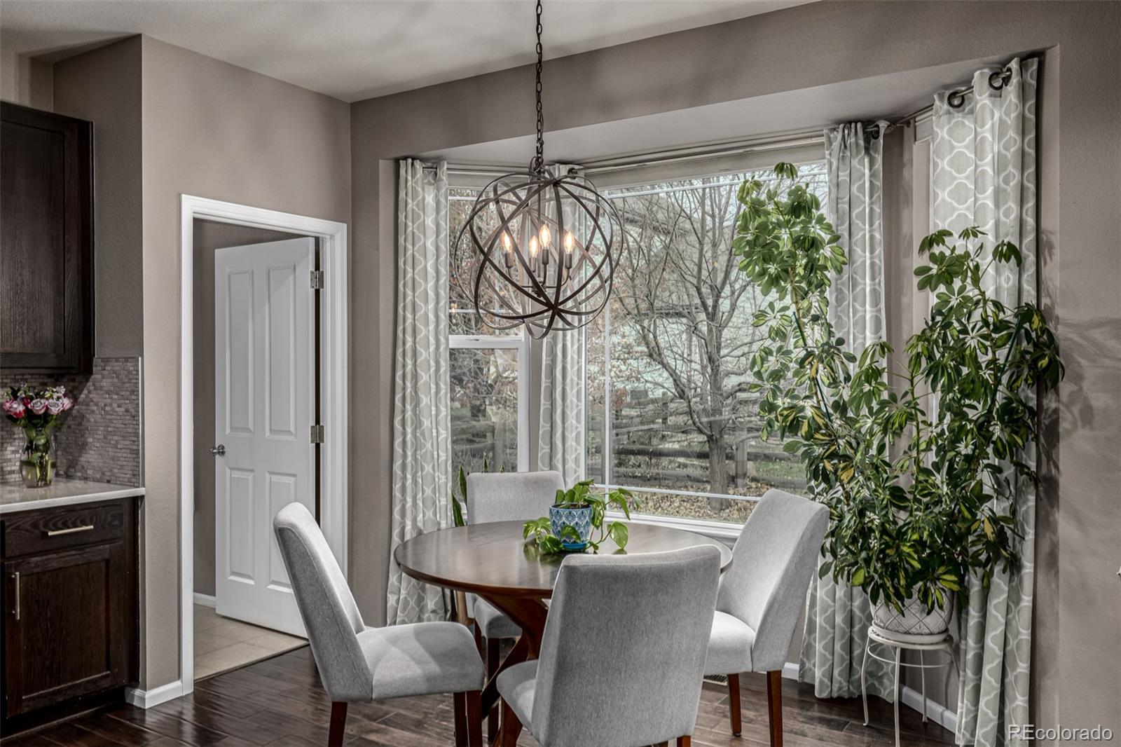 1138 Mircos Street Erie, CO 80516 - Photo 15 of 46 a view of a dining room with furniture window and outside view