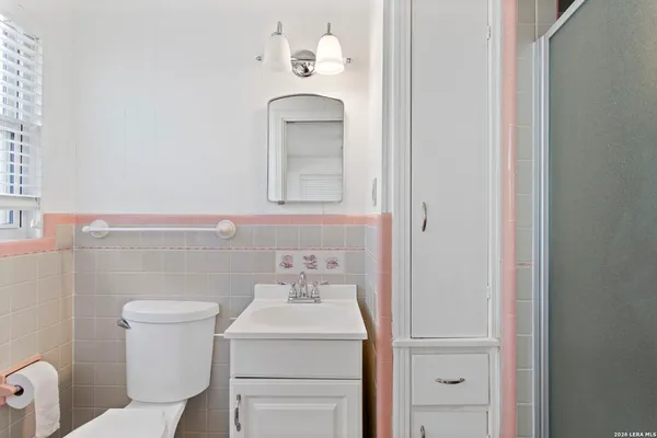 a bathroom with a sink and a toilet